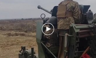 Ukrainian soldiers fire from a 40 mm Bofors L70 anti-aircraft gun provided by Lithuania