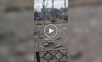 The occupiers walk through the bombed and deserted Avdiivka