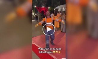 Positive garbage man starts dancing