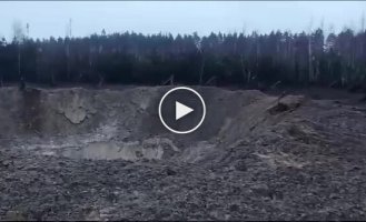 A crater at the crash site of a Russian missile shot down in the Kiev region