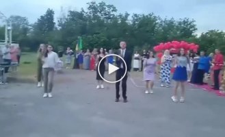 History teacher danced with girls at graduation