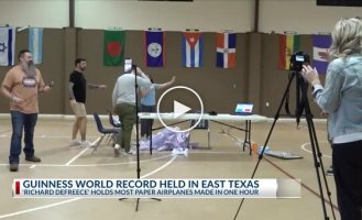 Record holder folds 250 paper airplanes in an hour