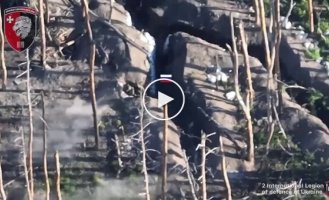 An occupier flies into the air after a direct hit from a Ukrainian shell into a trench