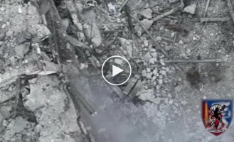 A Ukrainian drone drops grenades on Russian infantry near the village of Belogorivka in the Luhansk region