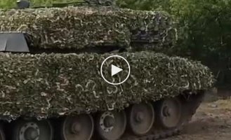 Ukrainian tank "Leopard 2A4" with anti-missile protection "Contact-1" and camouflage "Barracuda"