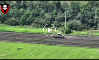Russian tank and Ukrainian kamikaze drone