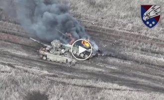 Two Russian T-72B tanks are on fire