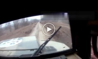 The moment a Ukrainian FPV drone hits a Russian Tiger-M armored vehicle