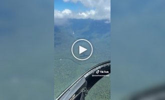 A true miracle of nature: a man showed his flight over the world's tallest waterfall