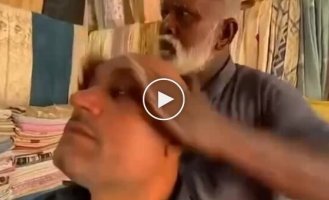 An unusual type of head massage has become popular in India