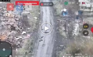 Eliminated Russian Invaders Lying in the Mud in the Middle of a Street in a Border Village in Sumy Region