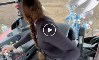 Tractor girl at work