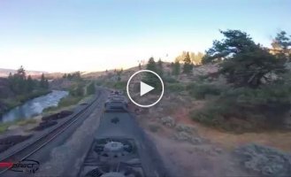 Flight of the year. Mind-blowing drone stunts over a moving freight train