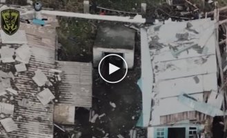 A Ukrainian FPV drone flies into a basement with Russian military in the village of Krynki, Kherson region