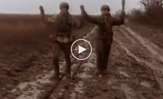 Ukrainian soldiers demonstrate dirty weather near Verbove in the Zaporozhye region