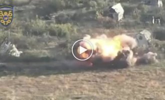 Russian armored vehicles are blown up by mines near the village of Vodyanoye in the Donetsk region
