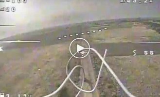 An enemy vehicle flies into a ditch and explodes before an attack by a Ukrainian drone