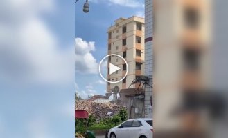 Building collapses on excavator during demolition