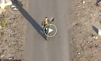 The occupier throws his motorcycle and weapons and runs away through the woods after seeing a Ukrainian drone