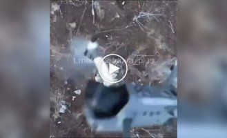 A Ukrainian drone drops a grenade directly on a Russian drone that was trying to shoot it down