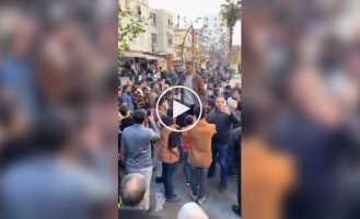 The tallest man against the background of ordinary people