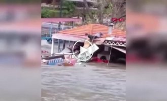 In Turkey, a dog was rescued that almost drowned during a powerful flood.