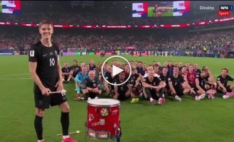 Norway's national football team celebrates a win in an unusual way