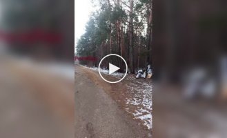A Russian drags three anti-tank mines on a rope and explodes on the road