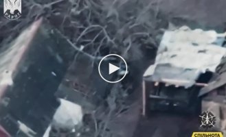 An enemy infantry fighting vehicle and the hiding place of the Russian invaders are on fire from a precise drone strike