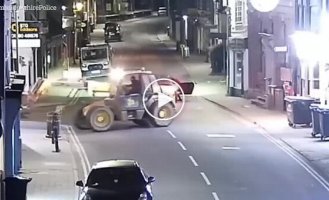 Robbers in Britain use a loader to steal an ATM