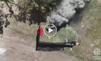 Russian MT-LB with roll cage destroyed after being hit by a conventional grenade dropped from a drone