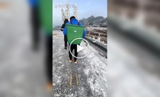 On bamboo planks on an icy road