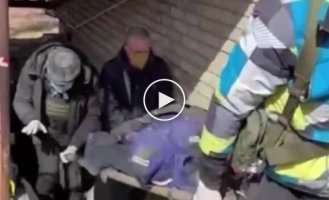 На видео - вынос тел украинцев, замученных российскими ублюдками из пыточного подвала