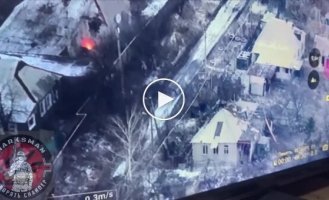 A Ukrainian tank fires point-blank at a house in Avdiivka where the occupiers are holed up