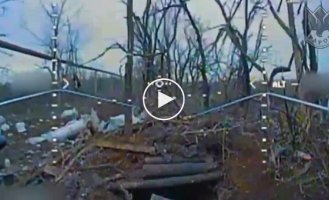 A Ukrainian kamikaze drone flies into a Russian dugout near Gorlovka in the Donetsk region