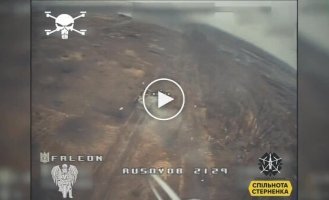 The drone hits an enemy BTR-82A with occupiers on its armor