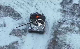 A Ukrainian drone drops grenades into the hatches of Russian tanks near the village of Belogorivka in the Lugansk region