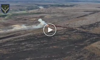 An armored vehicle of the occupiers with a tricolor on the roof is on fire after an unsuccessful assault in the Seversky direction