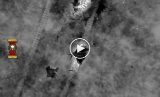 A Ukrainian drone with a thermal imager drops grenades on Russian soldiers in the Donetsk region