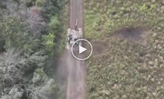 Russian tank hit twice by grenades dropped from drones