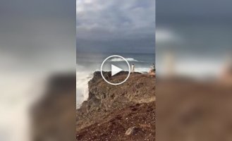 A wave washed over tourists in the Canary Islands