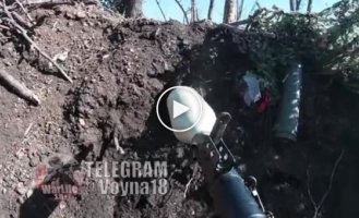 A Ukrainian soldier fires at Russian positions from RPG-7 and RPV-16 in the Zaporozhye direction
