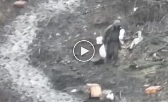 A soldier of the second army of the world wanders with two bags along a field road and is killed by a Ukrainian drone