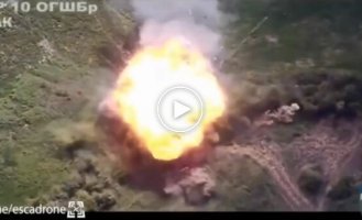 Detonation of the enemy self-propelled gun Msta-S after being hit by a drone