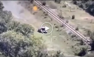 A Russian tank shatters after an attack from an American Javelin anti-tank missile system