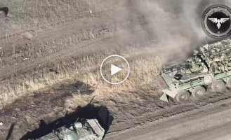 Ukrainian M2A2 Bradley infantry fighting vehicle, supported by FPV drones, destroys a Russian assault group near Avdiivka