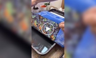 A girl showed the process of restoring an ancient book.