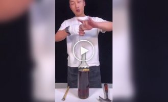How to get a fallen cork out of a bottle