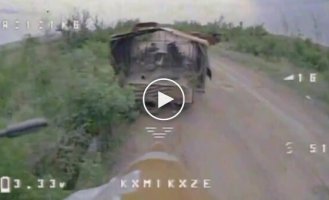 An enemy BMP-3 with a barbecue explodes after a kamikaze drone attack