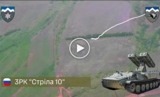 A kamikaze drone hits an enemy Strela-10 air defense system trying to shoot down a Ukrainian UAV